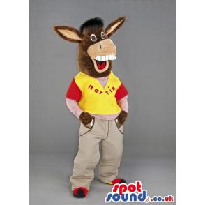 Donkey mascot in red-yellow t-shirt and in violet colour
