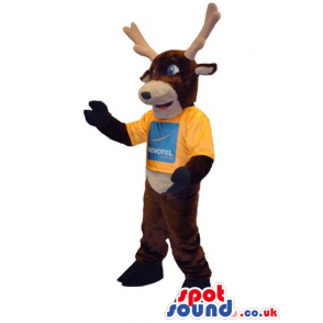 Brown And Beige Dear Mascot Wearing A T-Shirt With Logo -