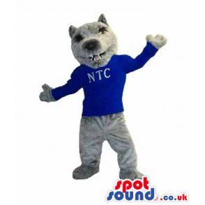 Grey Wolf Mascot Wearing A Blue T-Shirt With Letters - Custom