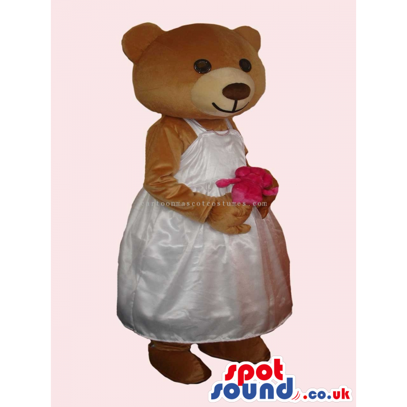 Brown Bear Girl Mascot With Flower Wearing A White Dress -