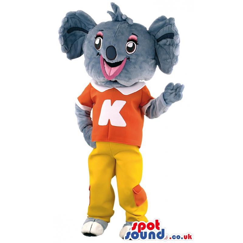 Small elephant mascot with yellow pants and orange t-shirt -