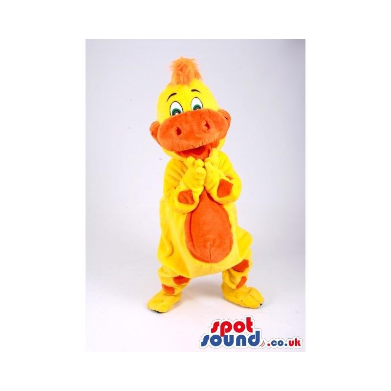 Yellow and orange crocodile mascot dancing with a nice smile -