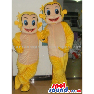 Two Small And Big Yellow Plush Monkey Mascots With A Beige