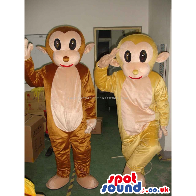 Two Yellow Or Brown Plush Monkey Mascots With A Beige Belly -