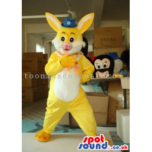 Yellow Rabbit Plush Mascot Wearing A Small Hat With White Belly