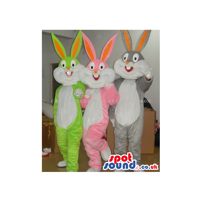 Three Rabbit Mascots In Pink, Green Or Grey With A White Belly