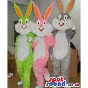 Three Rabbit Mascots In Pink, Green Or Grey With A White Belly