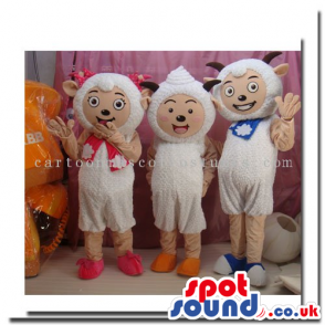 Three Different Sheep Mascots Wearing Scarfs And Ribbons -
