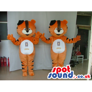 Two Twin Orange Tiger Animal Mascots With A White Belly And
