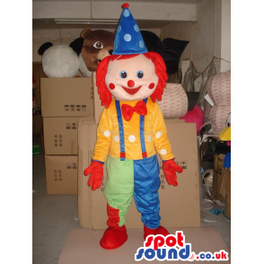 Funny Cute Colorful Clown Mascot With A Bow Tie And Red Hair -