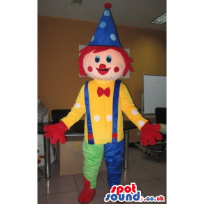 Funny Cute Colorful Clown Mascot With A Bow Tie And Red Hair -
