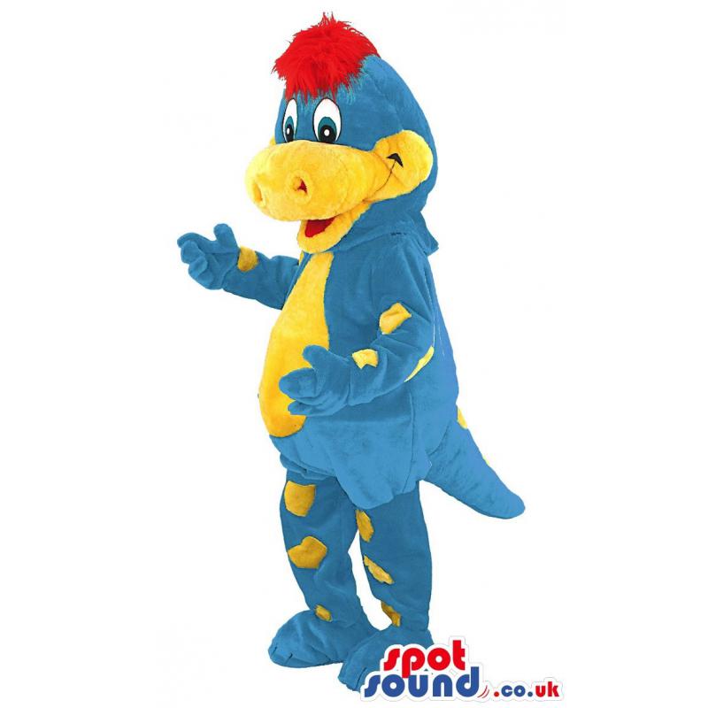 Yellow and blue crocodile mascot dancing with a nice smile -