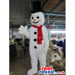 White Snowman Winter Christmas Mascot Wearing A Red Scarf -