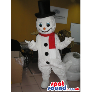 White Snowman Winter Christmas Mascot Wearing A Red Scarf -