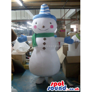 Snowman Mascot Wearing A Green Scarf And Blue Striped Hat -
