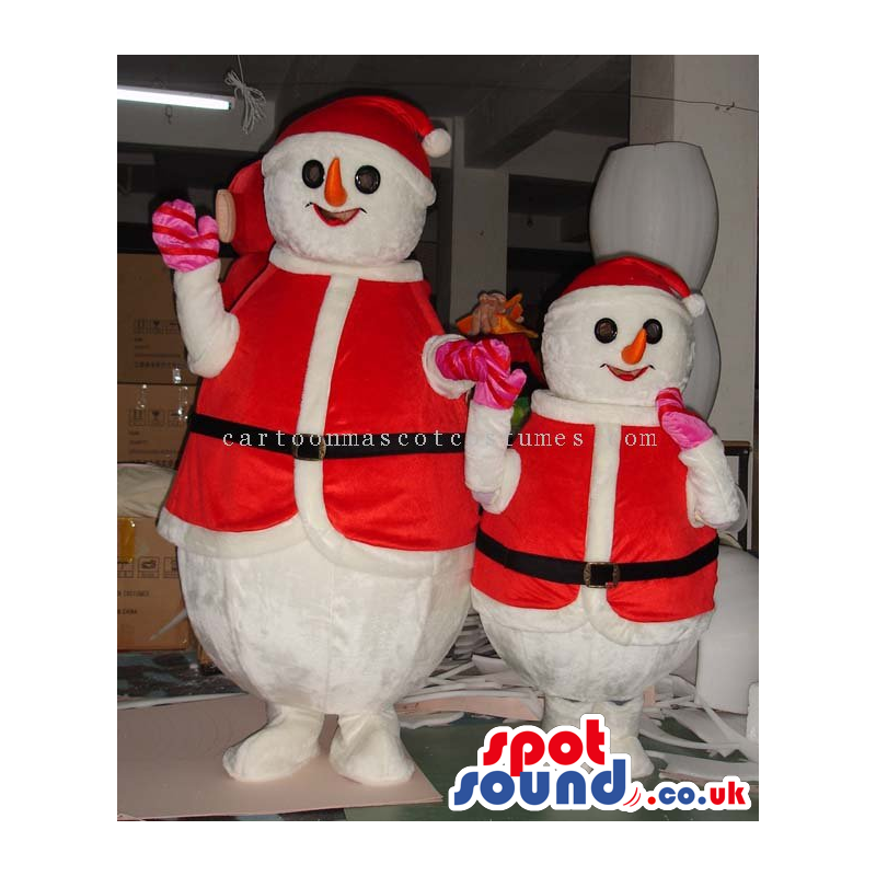 Two Snowmen Christmas Mascots Wearing Santa Claus Garments -