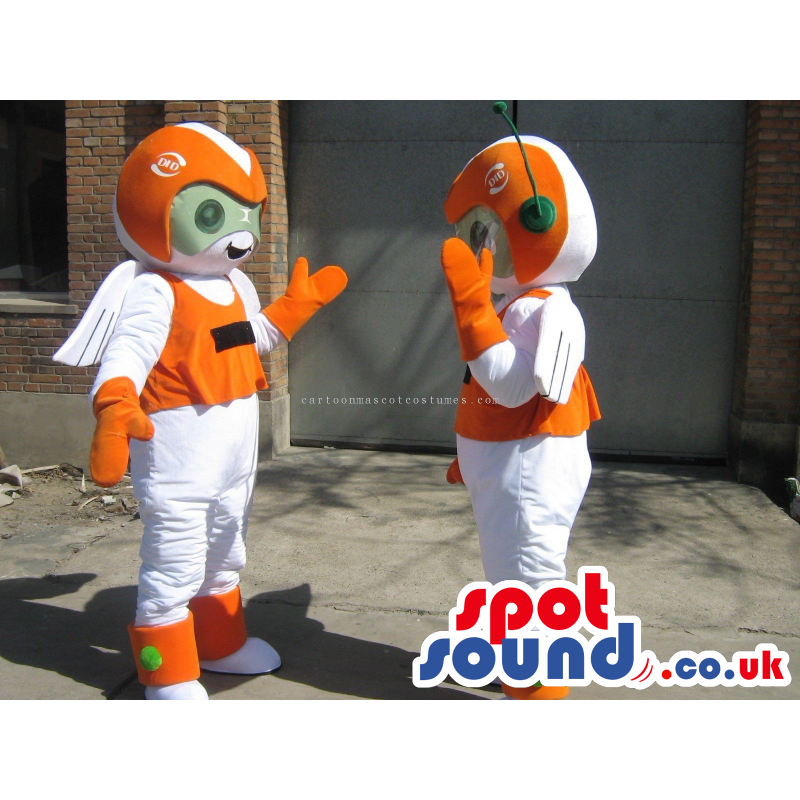 Two Orange And White Space Alien Creatures With Antennae -