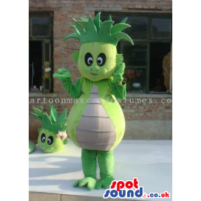 Green And Yellow Creature Character Mascot With A White Belly -