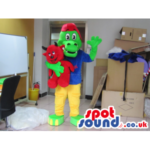 Flashy Green Dragon Mascot Wearing A Hat And A Blue T-Shirt -