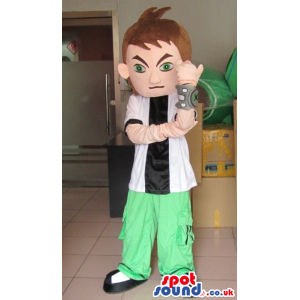 Human Boy Character Mascot Wearing Green Pants And A Device -