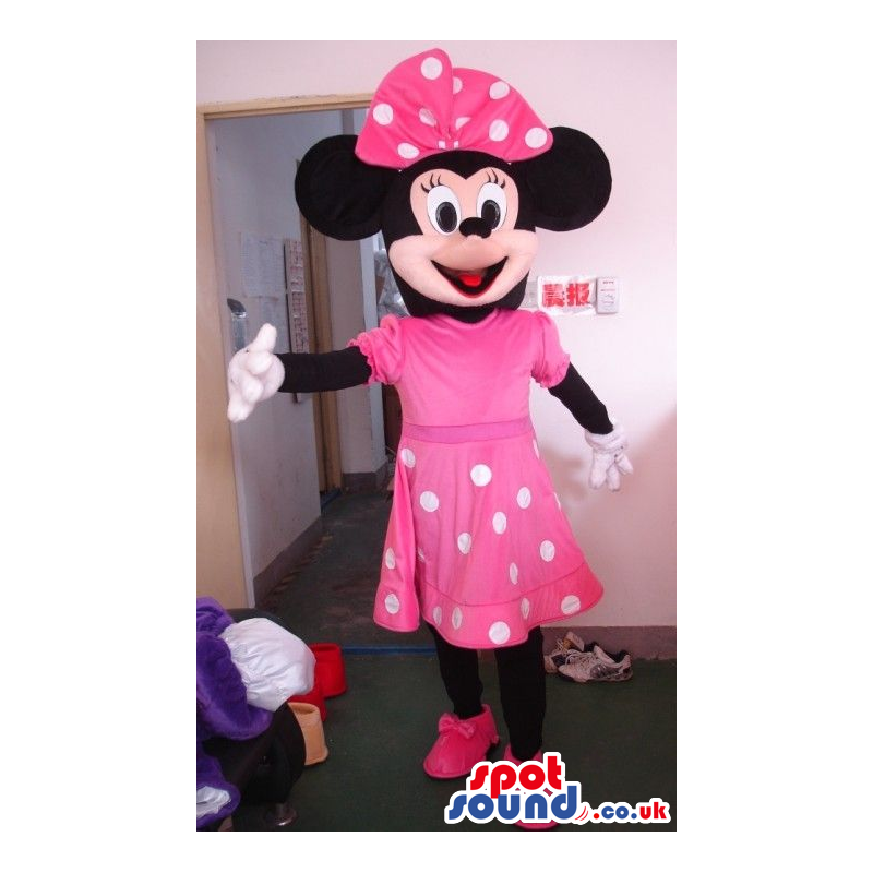 Minnie Mouse Disney Mascot Wearing A Pink Dress With Dots -