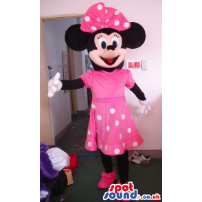 Minnie Mouse Disney Mascot Wearing A Pink Dress With Dots -