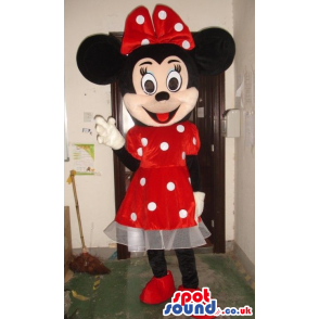 Minnie Mouse Disney Mascot Wearing A Red Dress With Dots -