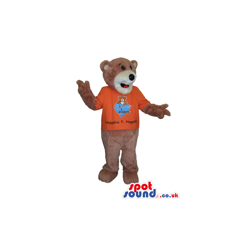 Brown Bear Animal Mascot Wearing An Orange T-Shirt With Logo -