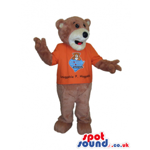 Brown Bear Animal Mascot Wearing An Orange T-Shirt With Logo -