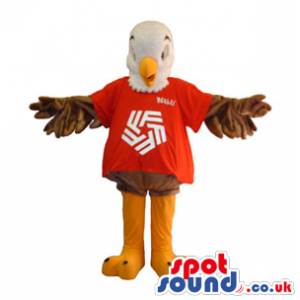 White And Brown Eagle Mascot Wearing A Red T-Shirt With A Logo