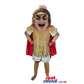 Soldier from roman in typical brown white costume & red cloak -