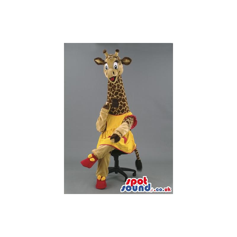 Modern girl giraffe mascot sitting on a stool and looks very