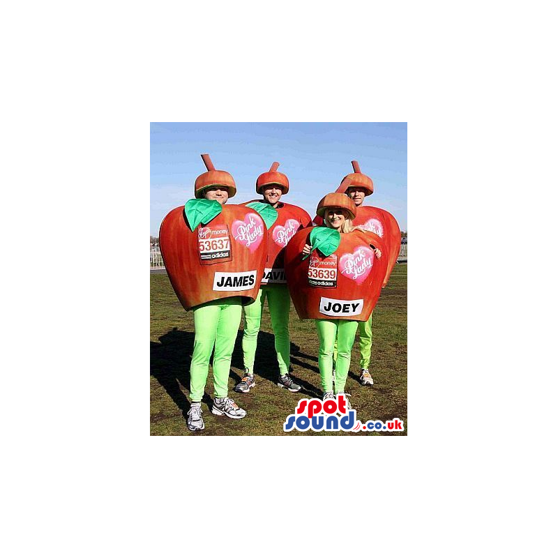 Four Red Apple Group Mascots Or Costumes With Text And Logos -