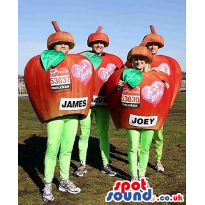 Four Red Apple Group Mascots Or Costumes With Text And Logos -