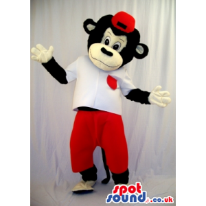 Black Monkey Plush Mascot Wearing A Red Cap And Pants - Custom