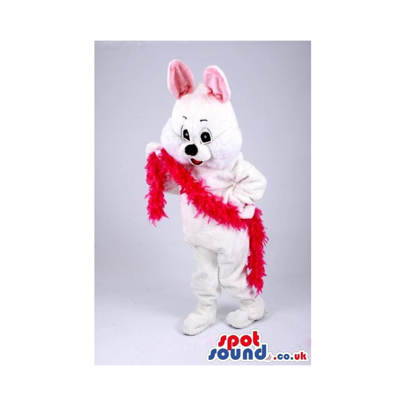 White rabbit mascot with a pink ear and red wool in his hand -