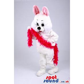 White rabbit mascot with a pink ear and red wool in his hand -