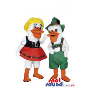 Two little girl bad boy ducks with very colourful clothes -