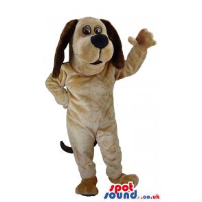 Snoopy dog mascot with hanging dark brown ears and waving hand