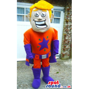 Smiling Blond Boy Wearing Superhero Orange And Purple Garments