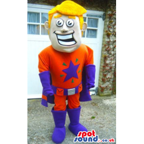 Smiling Blond Boy Wearing Superhero Orange And Purple Garments
