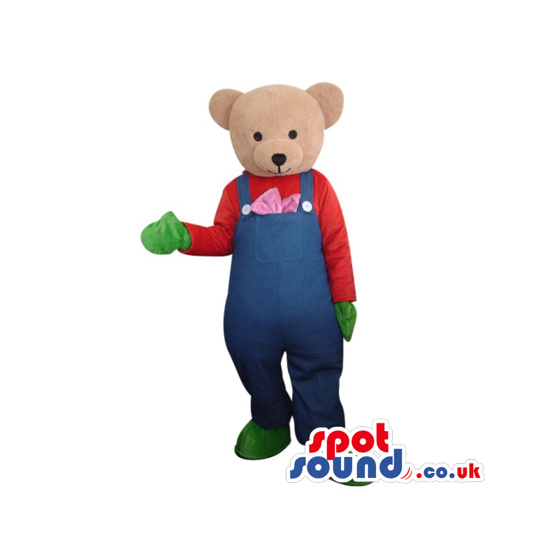 Light Brown Teddy Bear Wearing Blue Overalls And Green Gloves.