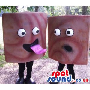 Two Are A Funny Pair Of Squared Candies With Comical Faces -