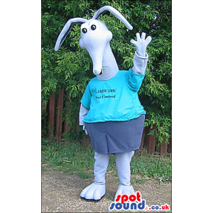 Blue Mascot With Thin Long Ears Wearing Blue Garments With Text