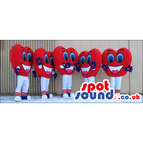 Group Of Five Heart Mascots In Red And White With Cute Faces -