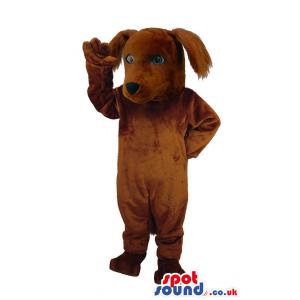 Cute brown puppy mascot standing to say hi to all of you