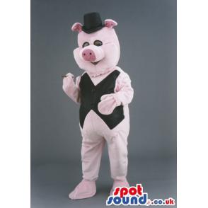 Pink pig mascot with a black jacket and hat - Custom Mascots