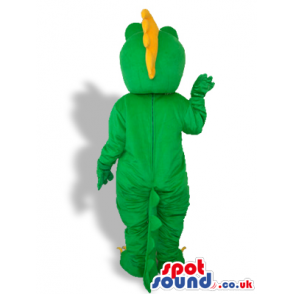 Cute Green Dragon Mascot With A Yellow Belly And Spiky Hair -