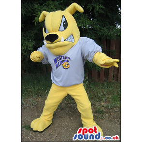 Yellow Bulldog Mascot Wearing A Sports T-Shirt With A Logo -