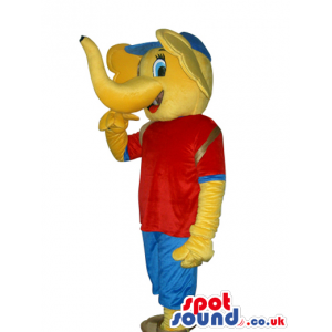 Funny Yellow Elephant Mascot Wearing Red And Blue Clothes -